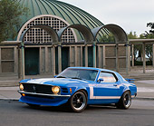 MST 01 RK0443 05
1970 Ford Mustang Trans Am Coupe Blue 3/4 Front View On Pavement By Building