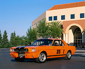 MST 01 RK0510 01
1966 Mustang Coupe Orange With Black Stripe Low 3/4 Side View On Pavement