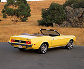 MST 01 RK0529 02
1973 Ford Mustang Convertible Yellow 3/4 Rear View On Pavement
