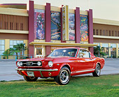 MST 01 RK0557 07
1966 Ford Mustang GT Fastback Red Low 3/4 Front View On Grass By Building