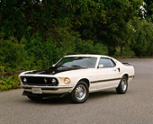 MST 01 RK0570 04
1969 Ford Mach 1 Mustang White And Black 3/4 Front View On Pavement By Trees