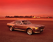 MST 01 RK0637 03
1967 Ford Mustang GT500M Fastback Silver With Black Stripes 3/4 Side View On Pavement Filtered