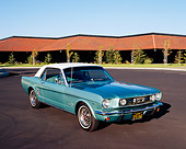 MST 01 RK0714 01
1966 Ford Mustang Turquoise White Top 3/4 Front View On Pavement By Buildings