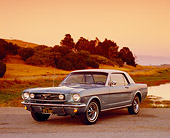 MST 01 RK0717 01
1966 Ford Mustang Turquoise White Top 3/4 Front View On Pavement By Dry Grass Hills Filtered