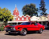MST 01 RK0732 03
1971 Ford Mustang Boss 351 Red Black Stripes Low 3/4 Front View On Pavement By Village