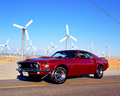MST 01 RK0751 01
1969 Ford Mustang Burgundy Low 3/4 Front View On Road By Wind Farm