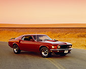 MST 01 RK0759 01
1969 Ford Mustang Burgundy 3/4 Front View On Road By Dry Grass Hills Filtered