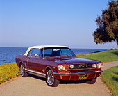 MST 01 RK0765 01
1966 Ford Mustang Convertible Amberglo 3/4 Front View On Pavement By Water