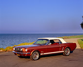 MST 01 RK0767 02
1966 Ford Mustang Convertible Amberglo 3/4 Side View On Pavement By Water