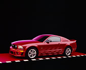MST 01 RK0890 08
2005 Ford Roush Mustang Red Side 3/4 View On Red Floor Checkered Line Studio