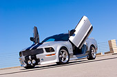 MST 01 RK0905 01
2005 Ford Mustang BBR 500 Silver And Black 3/4 Low Front View On Pavement