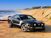 MST 01 RK0958 01
2007 Ford 427 Roush Mustang Black 3/4 Front View On Sand