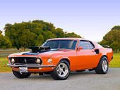 MST 01 RK1017 01
1969 Ford Mustang Mach I Orange 3/4 Front View On Pavement By Trees