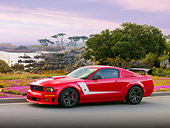 MST 01 RK1041 01
2008 Roush Ford Mustang 427R Trak Pak Red 3/4 Front View By Trees Water