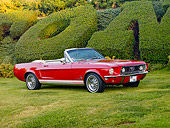 MST 01 RK1072 01
1968 Ford Mustang Convertible Red 3/4 Front View On Grass By Hedge