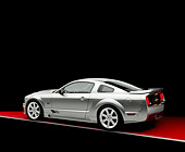 MST 02 RK0059 09
2005 Ford Saleen Mustang Supercharged Silver 3/4 Rear View On Red Floor Gray Line Studio