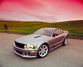 MST 02 RK0061 04
2005 Ford Saleen Mustang Supercharged Silver Wide Angle 3/4 Front View On Pavement By Grass Hills