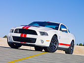 MST 03 RK0887 01
2011 Shelby Ford Mustang GT500 White With Red Stripe 3/4 Front View On Pavement