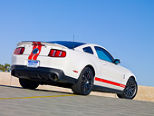 MST 03 RK0890 01
2011 Shelby Ford Mustang GT500 White With Red Stripe 3/4 Rear View On Pavement