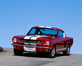 MST 03 RK0005 05
1966 Ford Mustang Shelby GT 350 Red White Stripes 3/4 Front View On Pavement Hill Blue Sky