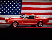 MST 03 RK0012 01
1967 Ford Shelby Mustang GT500 Red White Stripe 3/4 Side On Red Line Headlights On American Flag