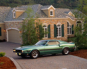 MST 03 RK0067 01
1969 Ford Mustang Shelby Cobra GT350 Green 3/4 Side View On Driveway By House
