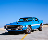 MST 03 RK0146 01
1969 Ford Shelby Mustang GT500 Fastback Blue 3/4 Front View On Pavement Blue Sky