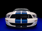 MST 03 RK0152 01
2007 Ford Shelby GT500 White Blue Stripes Low Head On View Studio