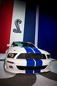 MST 03 RK0182 01
2007 Ford Shelby Mustang GT500 FR Road And Track Coupe White And Blue Head On View