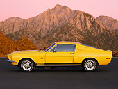 MST 03 RK0186 01
1968 Ford Mustang Shelby GT500KR Coupe Yellow Profile View On Pavement By Mountains