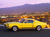 MST 03 RK0187 01
1968 Ford Mustang Shelby GT500KR Coupe Yellow Front 3/4 View Pavement Mountain City