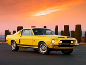 MST 03 RK0191 01
1968 Ford Mustang Shelby GT500KR Coupe Yellow Front 3/4 View On Pavement By Shrubs