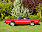 MST 03 RK0199 01
1969 Ford Mustang Shelby GT 500 Convertible Red With Yellow Stripe Profile View On Grass By Trees