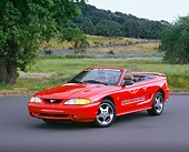 MST 04 RK0009 04
1994 Ford Mustang Cobra Convertible Indy Racing Car Red 3/4 Front View On Pavement Trees