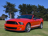 MST 04 RK0041 01
2007 Ford Shelby Cobra GT500 Convertible Red 3/4 Low Front View On Grass