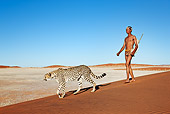 PEO 08 MH0007 01
San Hunter Walking With Traditional Bow And Arrow And Cheetah Namibia