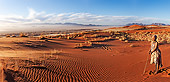 PEO 08 MH0011 01
Elderly San Woman Standing In Desert Namibia