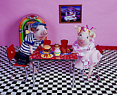 PIG 01 RK0233 07
Hoggy Diner Two Pigs At Table On Checkered Floor By Juke Box