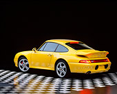 POR 01 RK0002 06
1996 Porsche Twin Turbo Yellow 3/4 Rear View Checkered Floor Studio