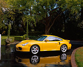 POR 01 RK0018 03
2001 Porsche 996 Twin Turbo Yellow 3/4 Side View On Pavement