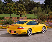 POR 01 RK0024 06
2001 Porsche 996 Twin Turbo Yellow 3/4 Rear View On Pavement