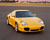 POR 01 RK0032 01
2001 Porsche Twin Turbo Yellow 3/4 Front View On Pavement