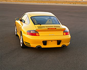 POR 01 RK0033 04
2001 Porsche Twin Turbo Yellow 3/4 Rear View On Pavement