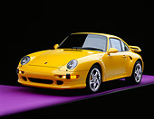 POR 02 RK0005 09
1997 Porsche Turbo S Yellow Front 3/4 View On Purple Floor Studio