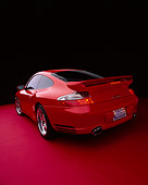 POR 03 RK0131 10
2003 Porsche Turbo X50 Red Wide Angle 3/4 Rear View On Red Floor Studio