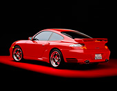 POR 03 RK0140 06
2003 Porsche Turbo X50 Red Rear 3/4 View On Red Floor Studio