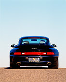 POR 03 RK0009 02
1996 Porsche Turbo Midnight Blue Rear Shot On Pavement Blue Sky