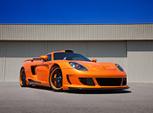 POR 04 RK0835 01
2008 Porsche Gemballa Mirage GT Orange 3/4 Front View On Pavement