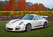 POR 04 RK0942 01
2012 Porsche 911 GT3 RS White 3/4 Front View On Grass By Autumn Trees