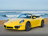 POR 04 RK0943 01
2013 Porsche 911 Carrera S Cabriolet Yellow 3/4 Front View On Pavement By Beach